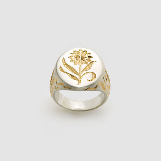 Castro Smith - Hand engraved signet ring with a sunflower on the face of the ring and corn details on the sides. 