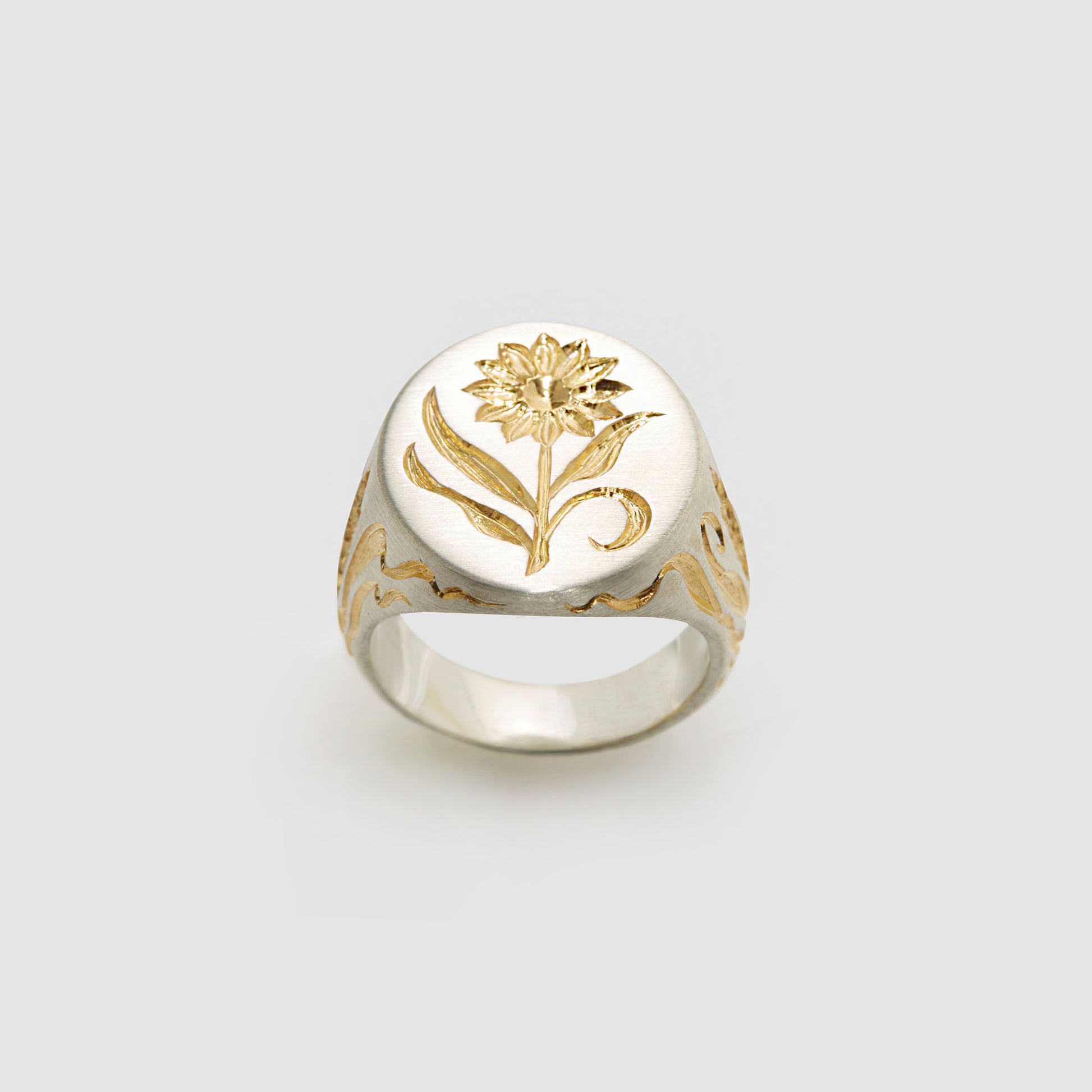 Castro Smith - Hand engraved signet ring with a sunflower on the face of the ring and corn details on the sides. 