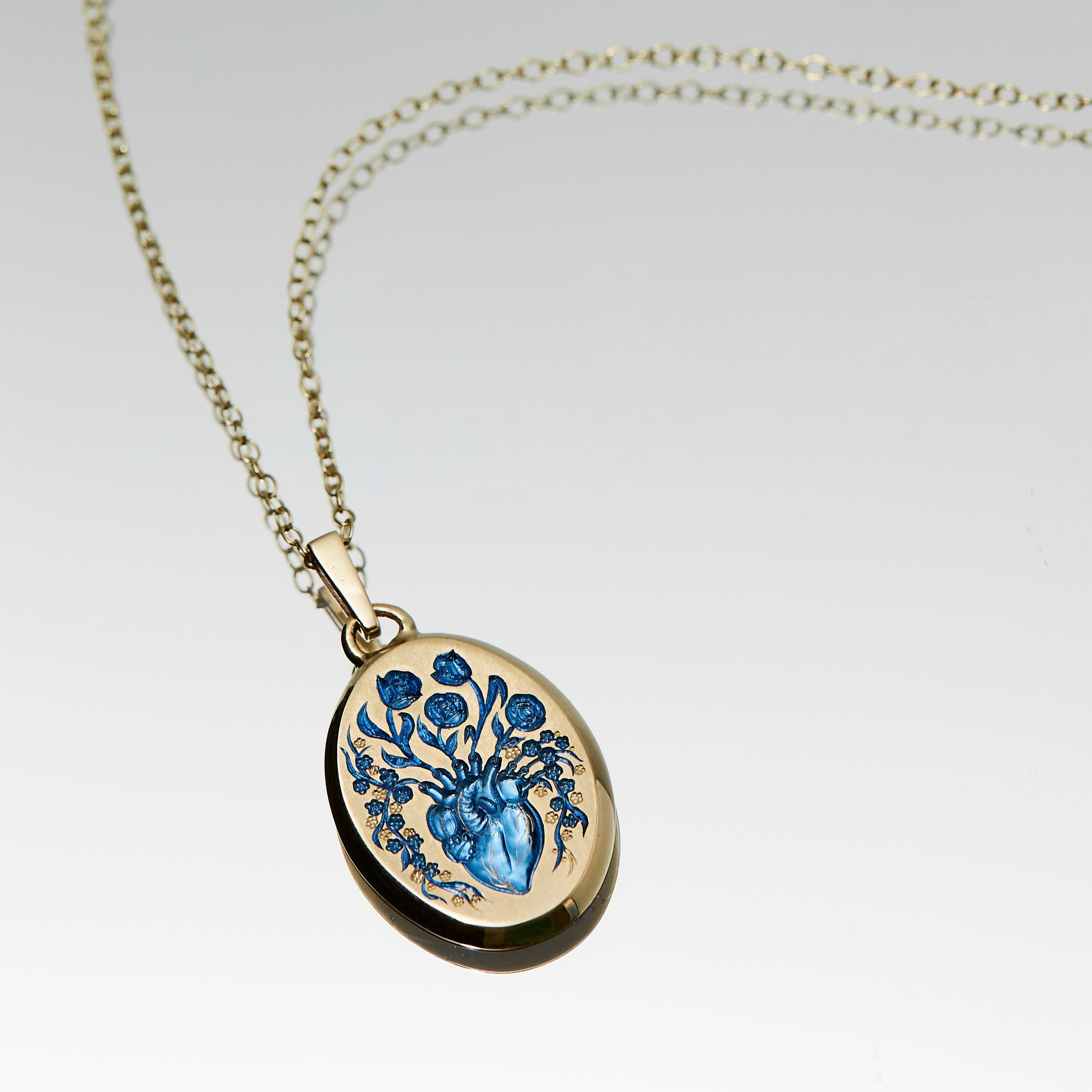 Castro Smith Heart Jewelry - Small Gold Heart Pendant with Blue  with gold chain. 