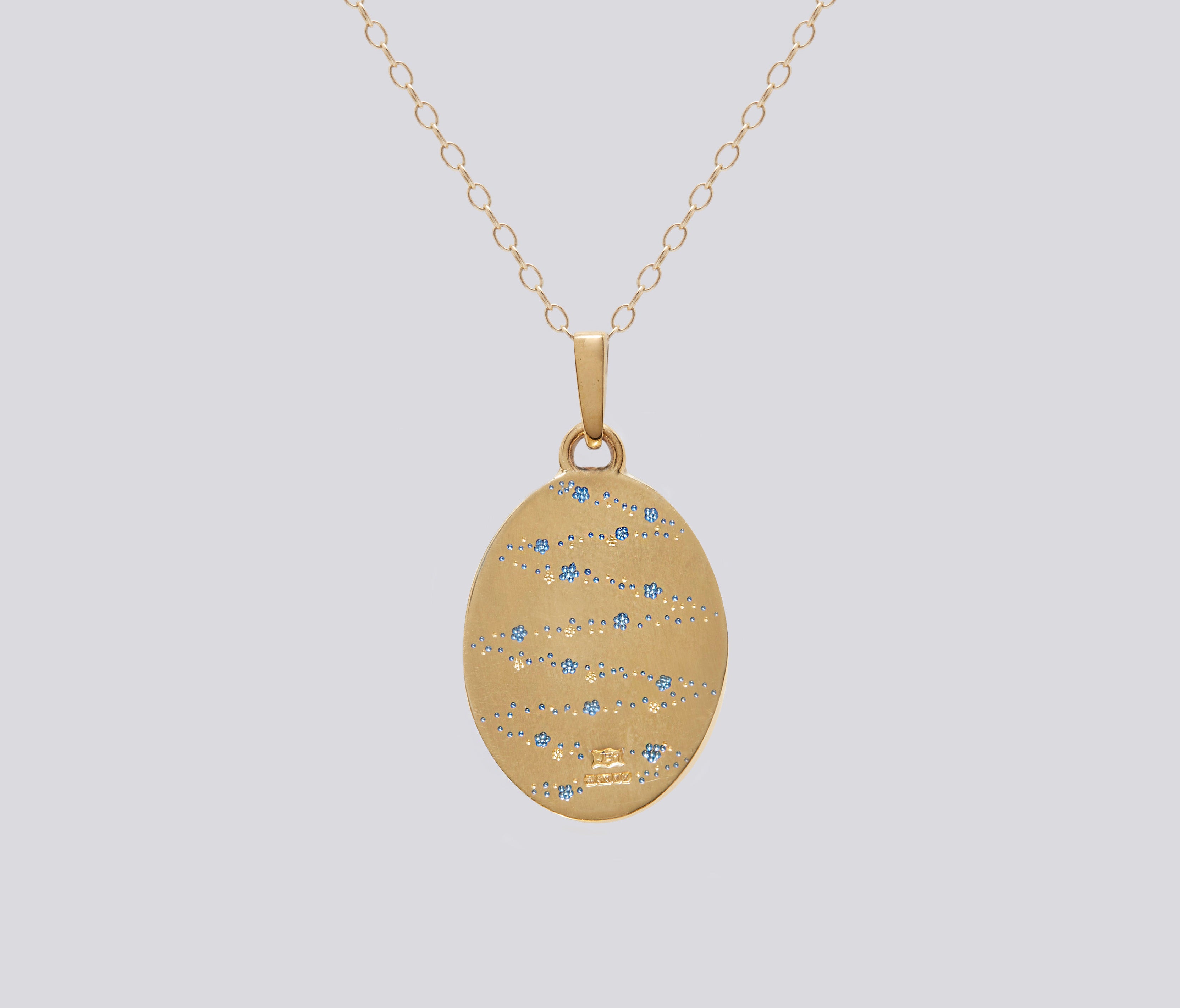 Small gold heart pendant necklace symbolizing healing and positive energy for the wearer’s organs and well-being.