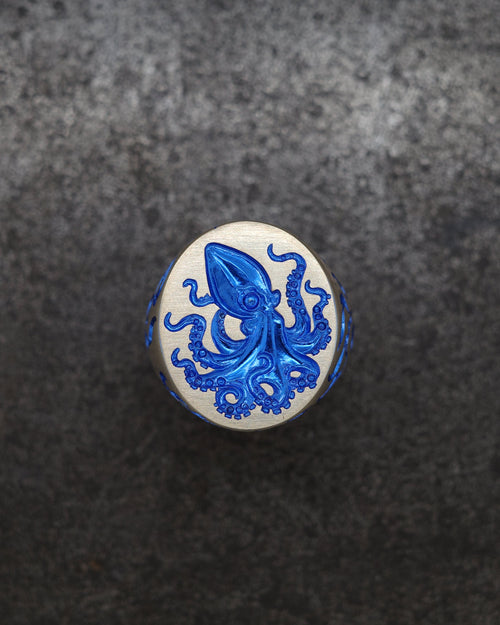 Gold ring with Octopus engraved on the face