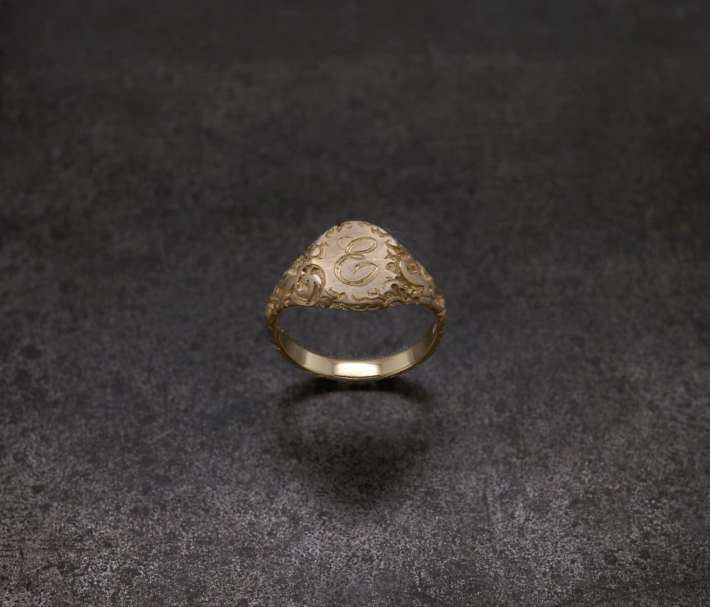 E Minor Signet Ring featuring custom initials in an intricately designed mini signet format.