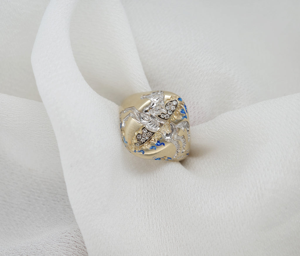 Fire Horse Ring showcased on soft white fabric with intricate detailing and shimmering accents.