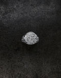 Mini Chisel Signet ring featuring an intricately chiseled crystalline design on a dark background.
