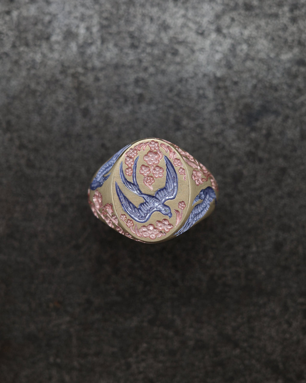 Classic Signet ring with a swooping swallow and flowers 