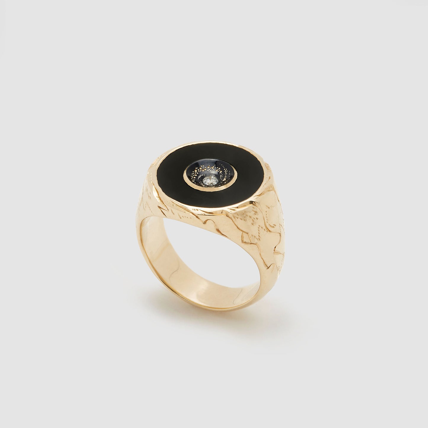 Castro Smith Jewelry Gold Oubliette Signet Ring with Onyx Around a Concave Galaxy with a Centre Diamond in Right Side View.