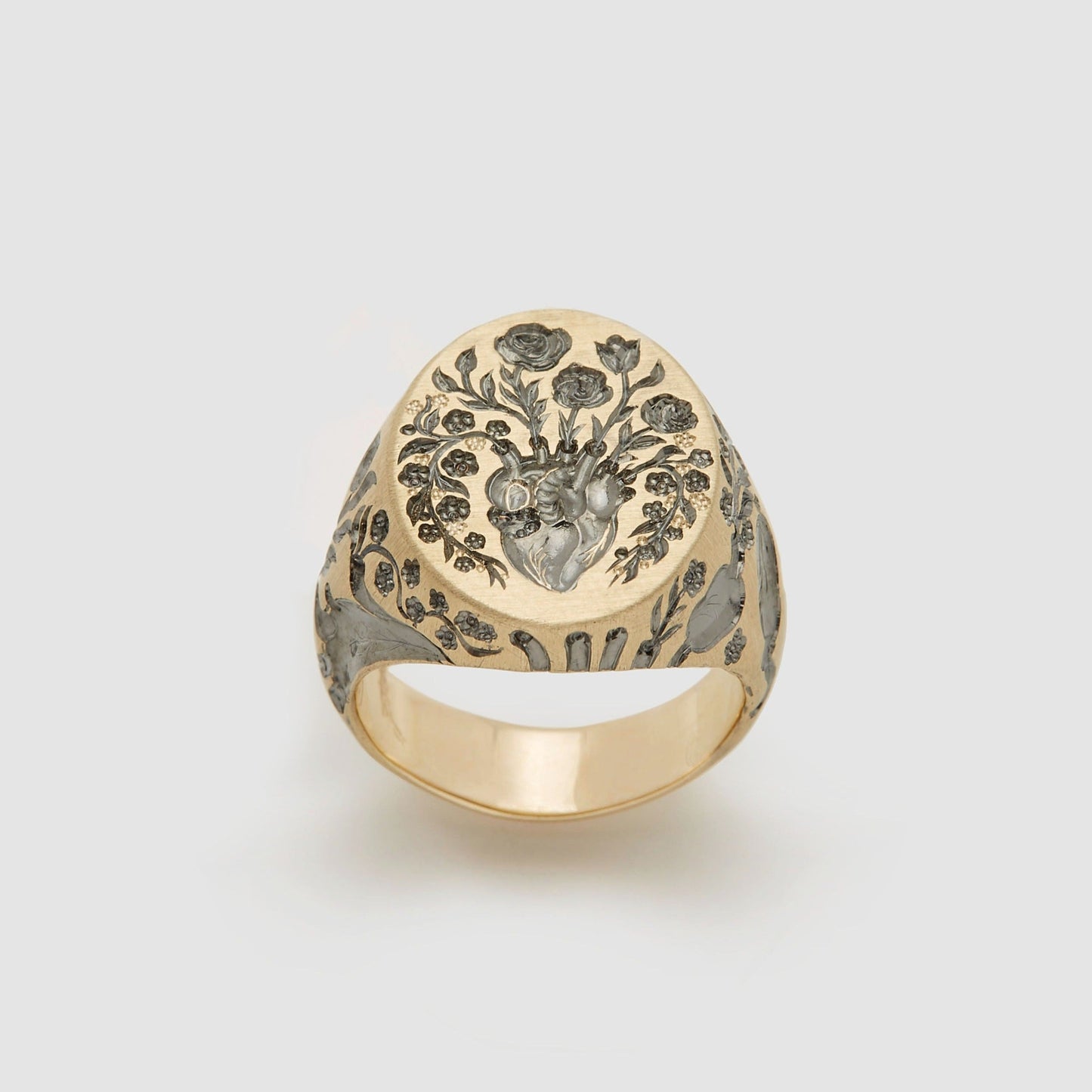 Castro Smith Jewelry Gold Anatomical Heart Signet Ring with Gray Engravings.
