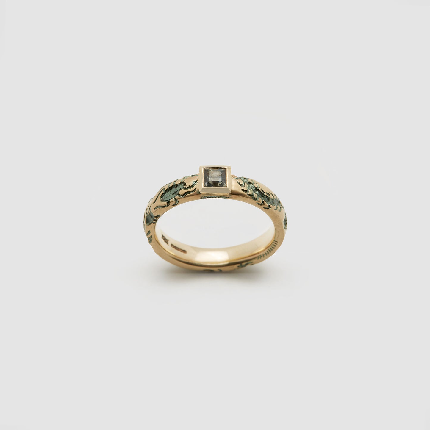 Castro Smith Jewelry Gold Undergrowth Ring with a Square Cut Sapphire.